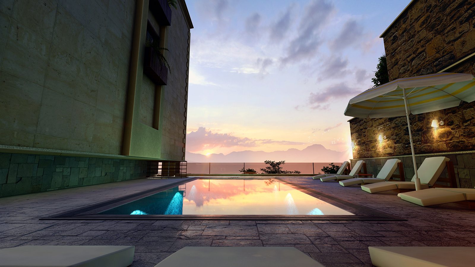 The pool at sunset with the mountains beyond